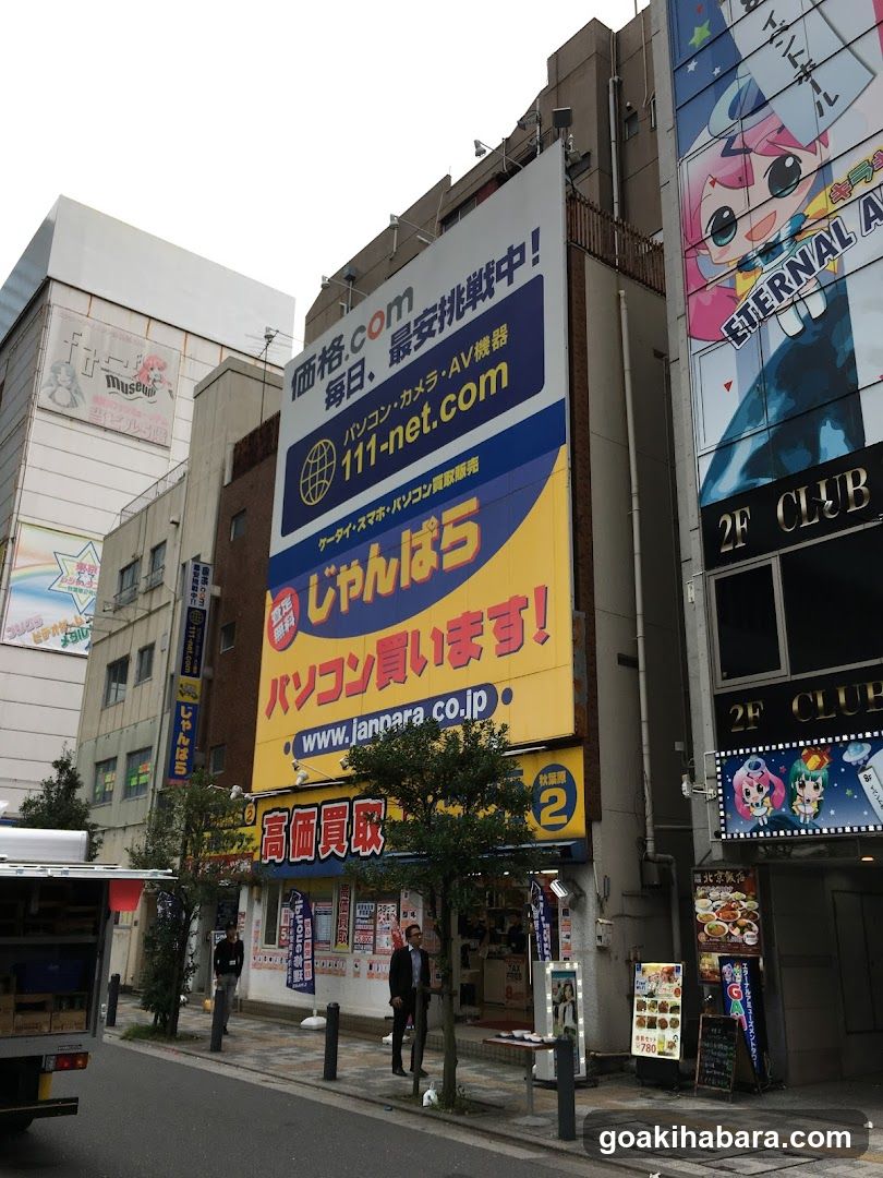 Street scene with shop signs and buildings