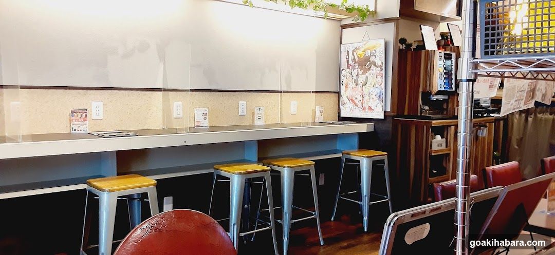 Interior of a cafe or restaurant with bar stools and protective partitions