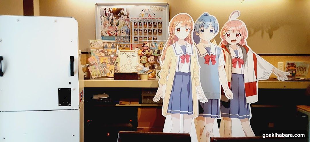 Anime Character Cutouts and Merchandise Display