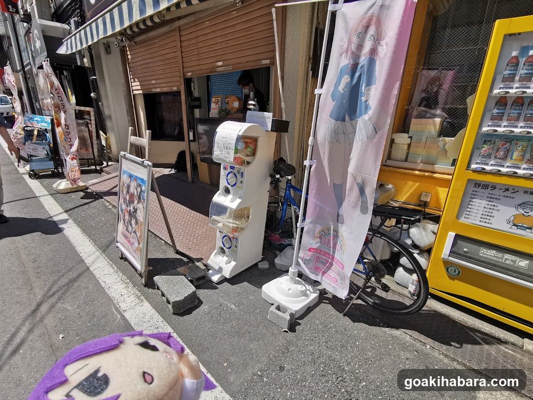 Anime-themed vending machines and merchandise display