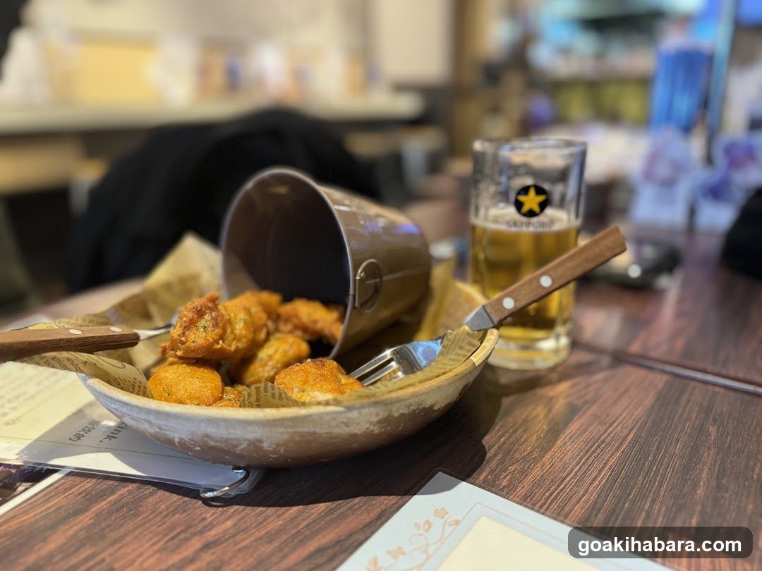 Fried Food and Beer on Table