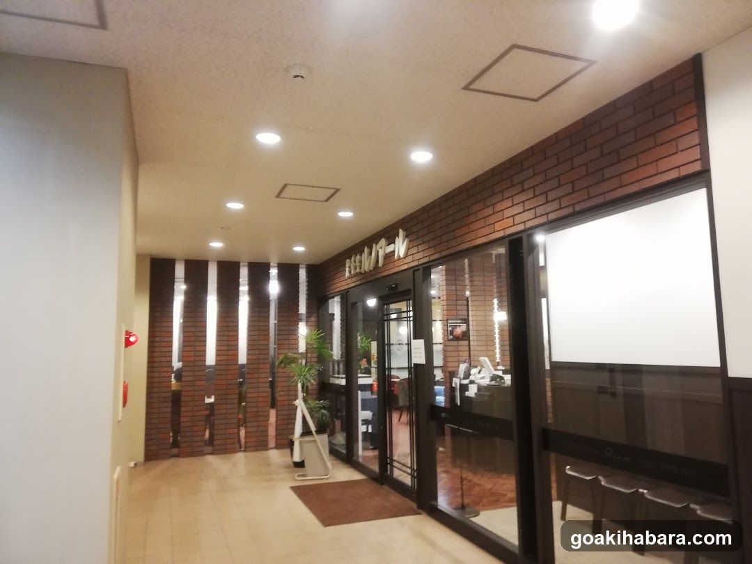 Interior Hallway with Brick Wall and Glass Doors