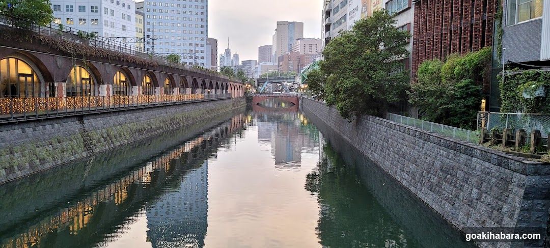 Urban Canal Reflections at Dusk