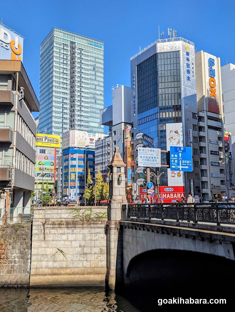 Urban Street Scene with River and Bridge