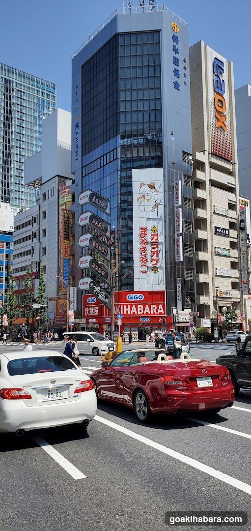 Urban Street Scene with Cars and Buildings