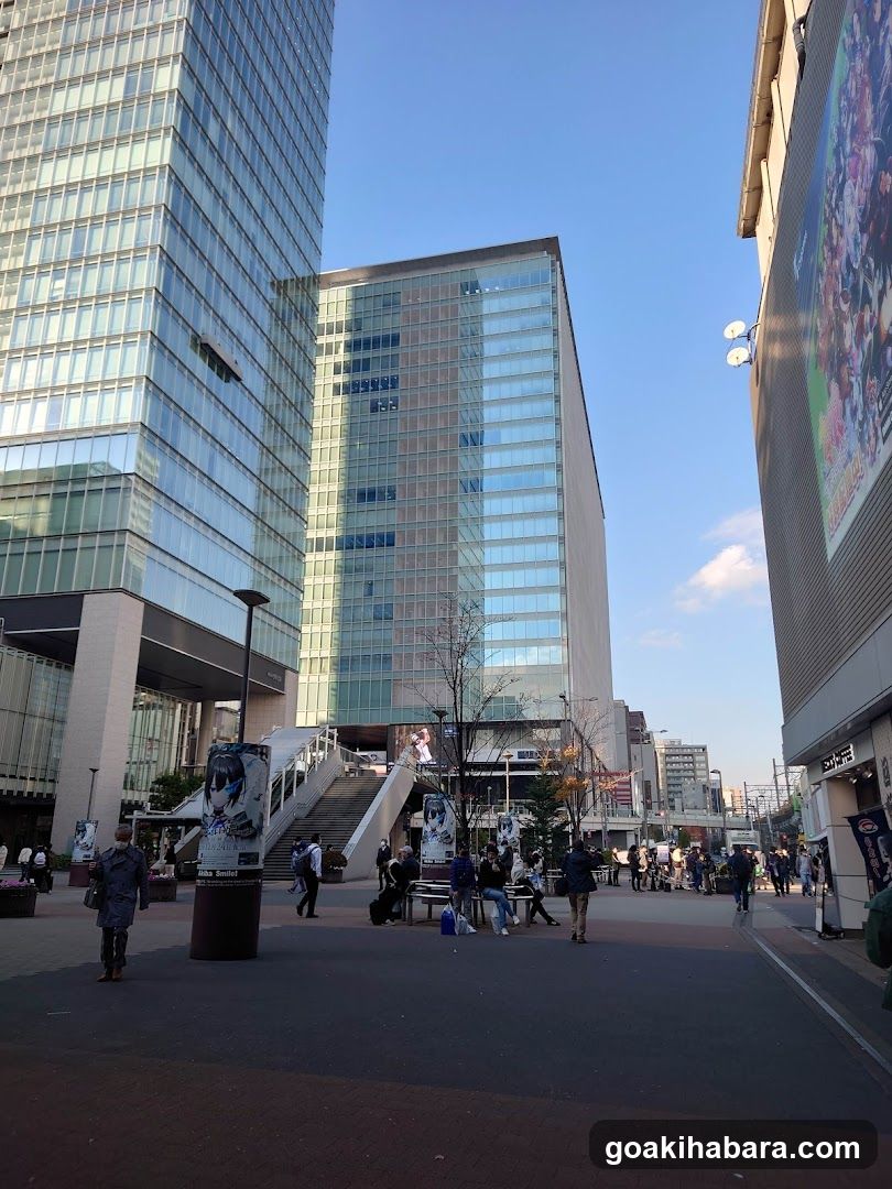 Urban plaza with modern buildings and pedestrians