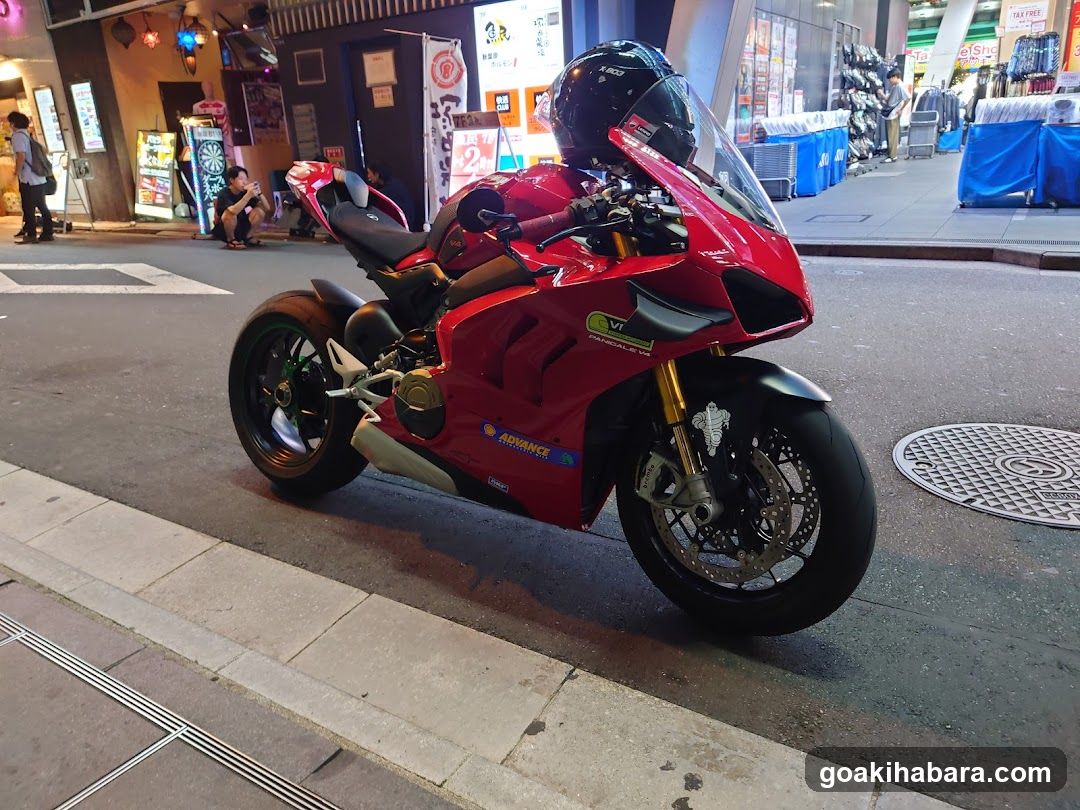 Red Motorcycle on Street at Night