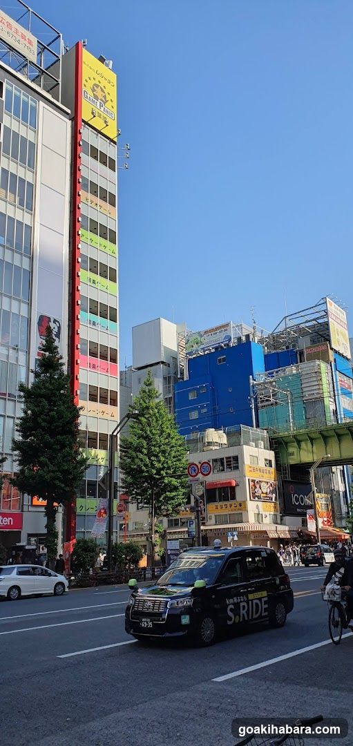 Urban Street Scene with Buildings and Vehicles