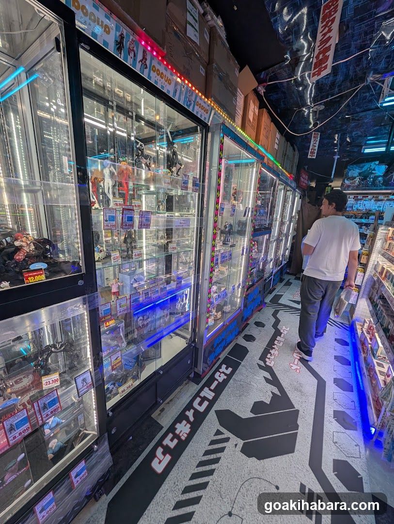 Aisle of Arcade Machines and Merchandise Display