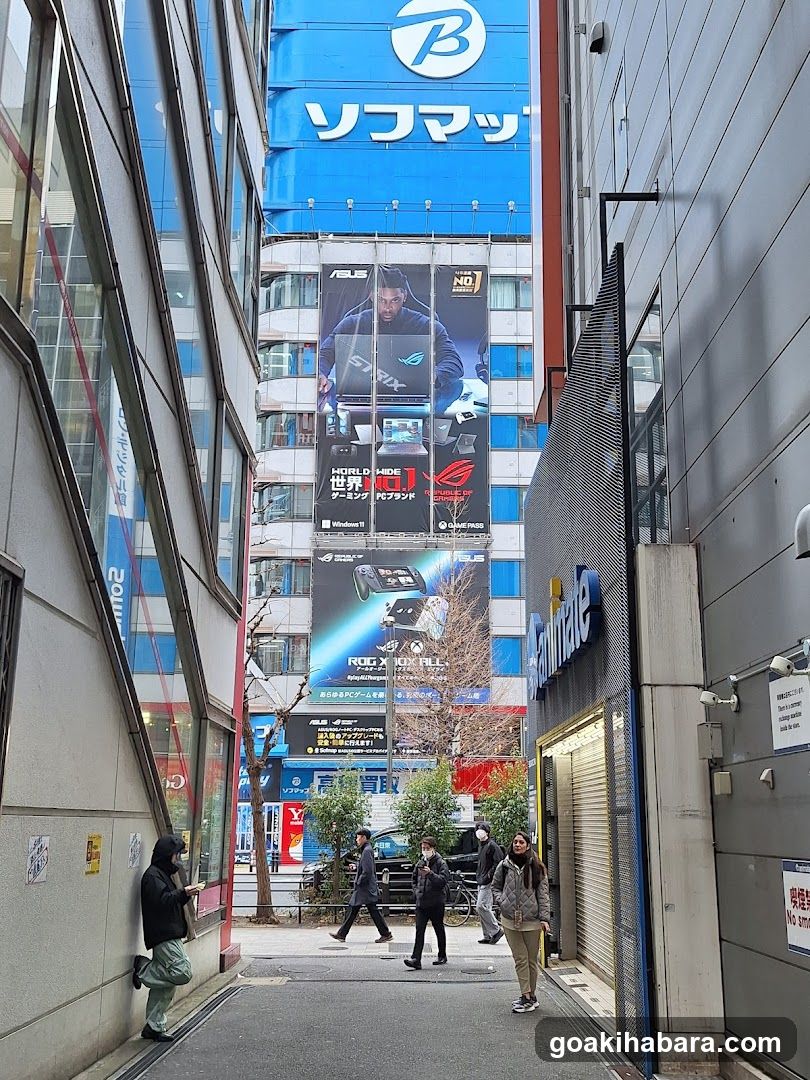 Street scene with billboards and pedestrians