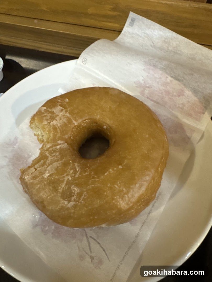 Glazed Donut with Bite Taken