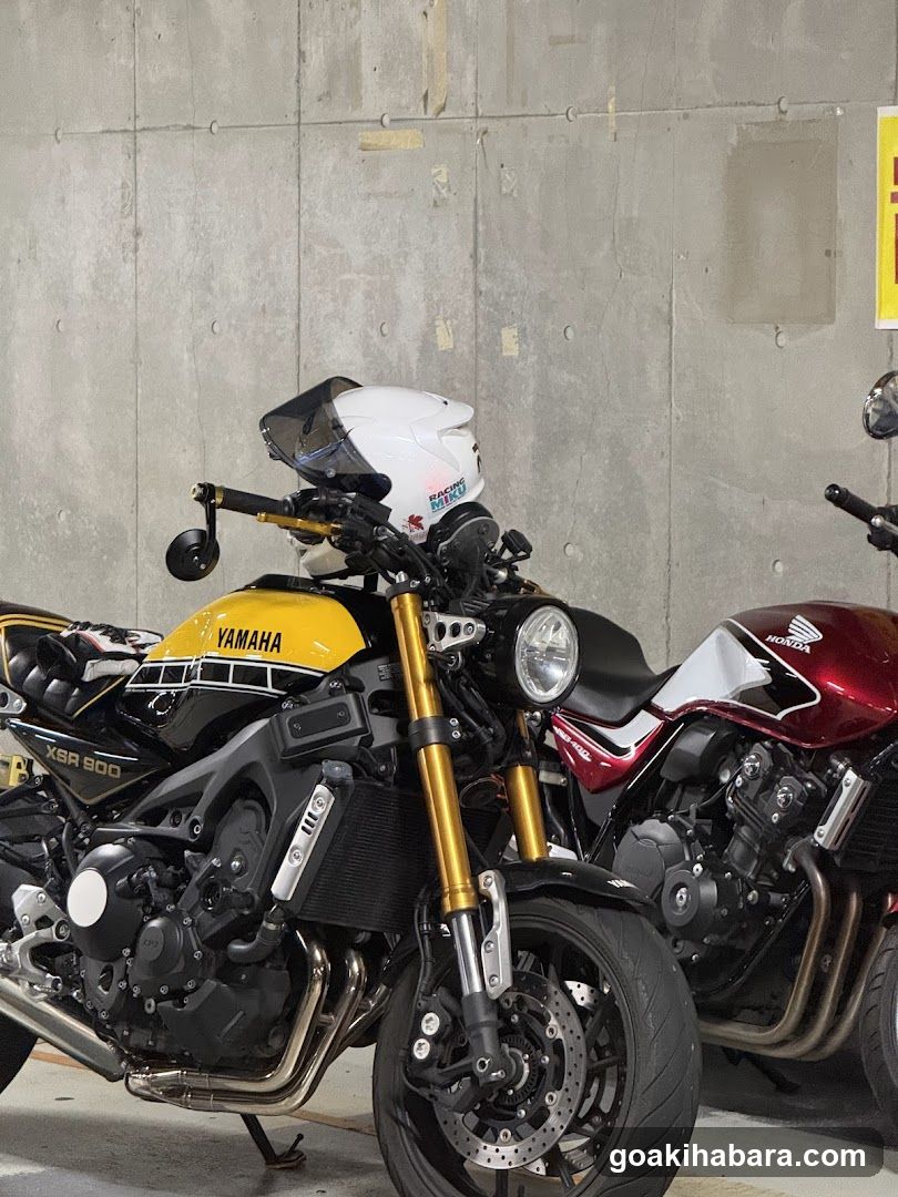 Yamaha XSR900 and Honda motorcycle parked indoors