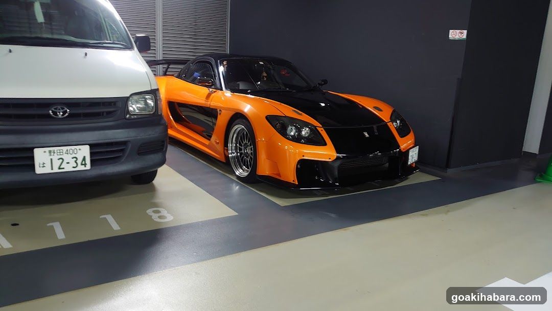 Orange Sports Car in Parking Garage