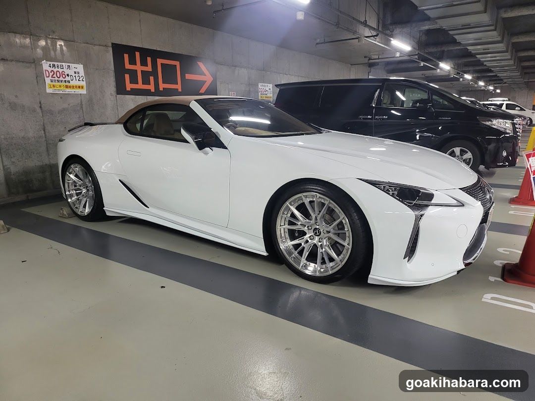 White Lexus LC500 in parking garage