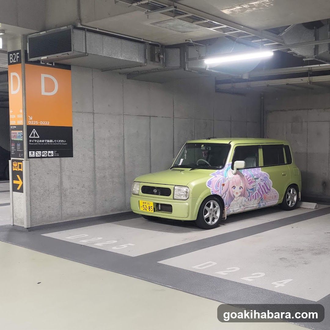 Anime-themed car in parking garage
