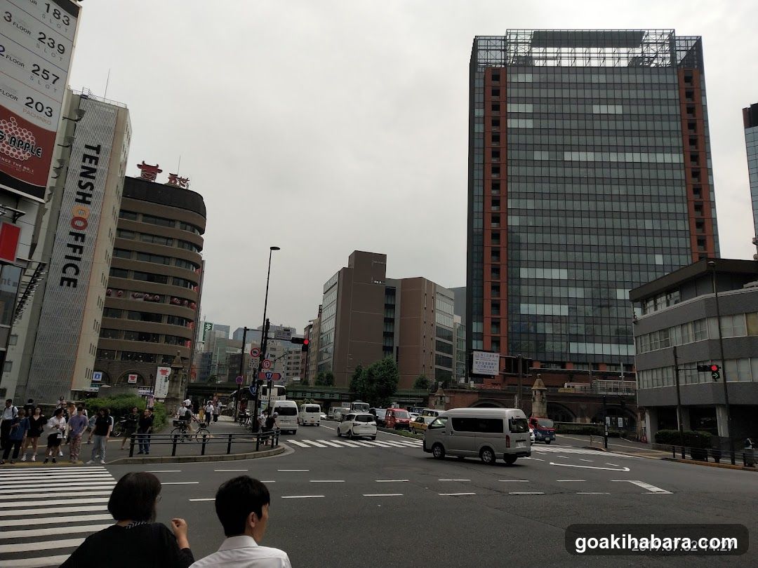 Urban Street Scene with Pedestrians and Vehicles