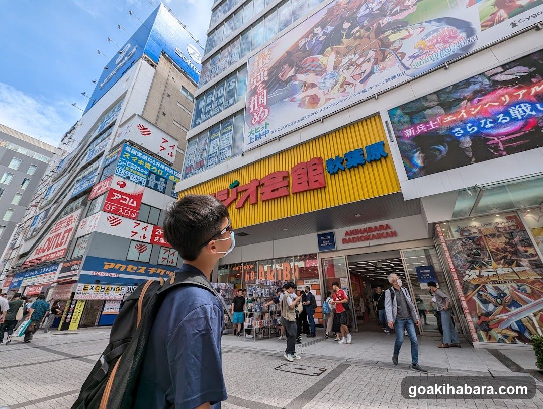 Anime Store Exterior with Pedestrians