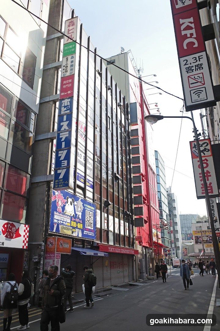 Urban Street Scene with Storefronts and Signage