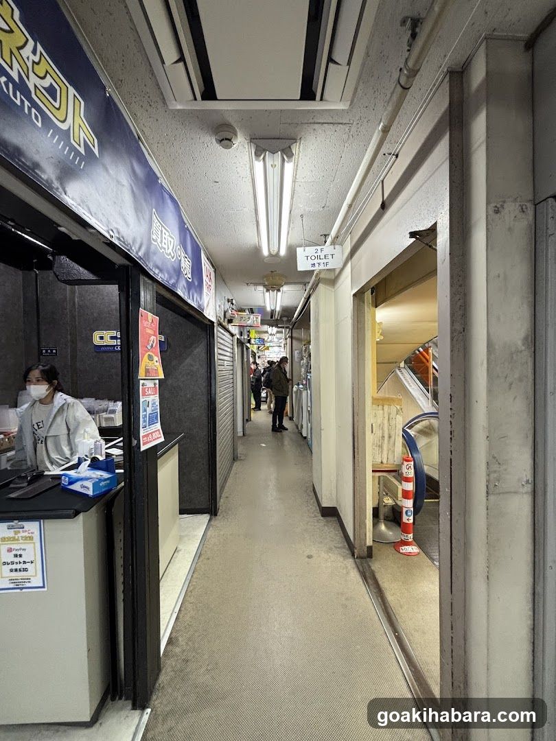 Corridor with shop and restroom sign