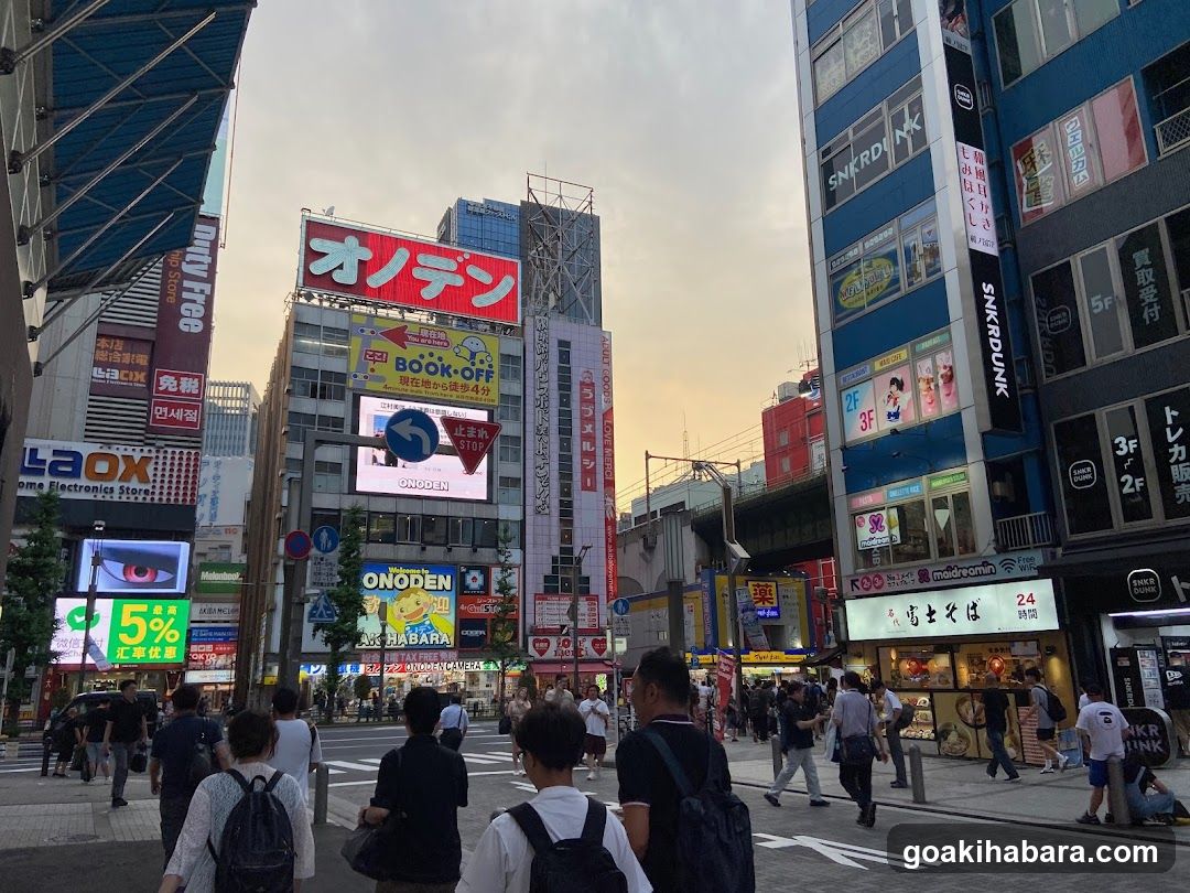 Urban Street Scene with Neon Signs and Pedestrians