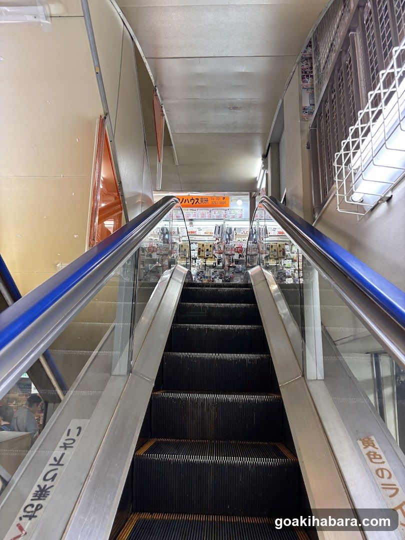 Escalator View to Store Entrance