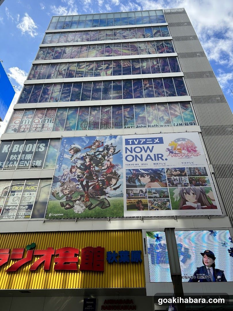 Anime Building Exterior with Large Banners and Shop Signage