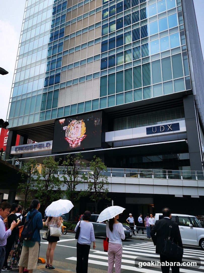 Urban Street Scene with Pedestrians and Modern Building