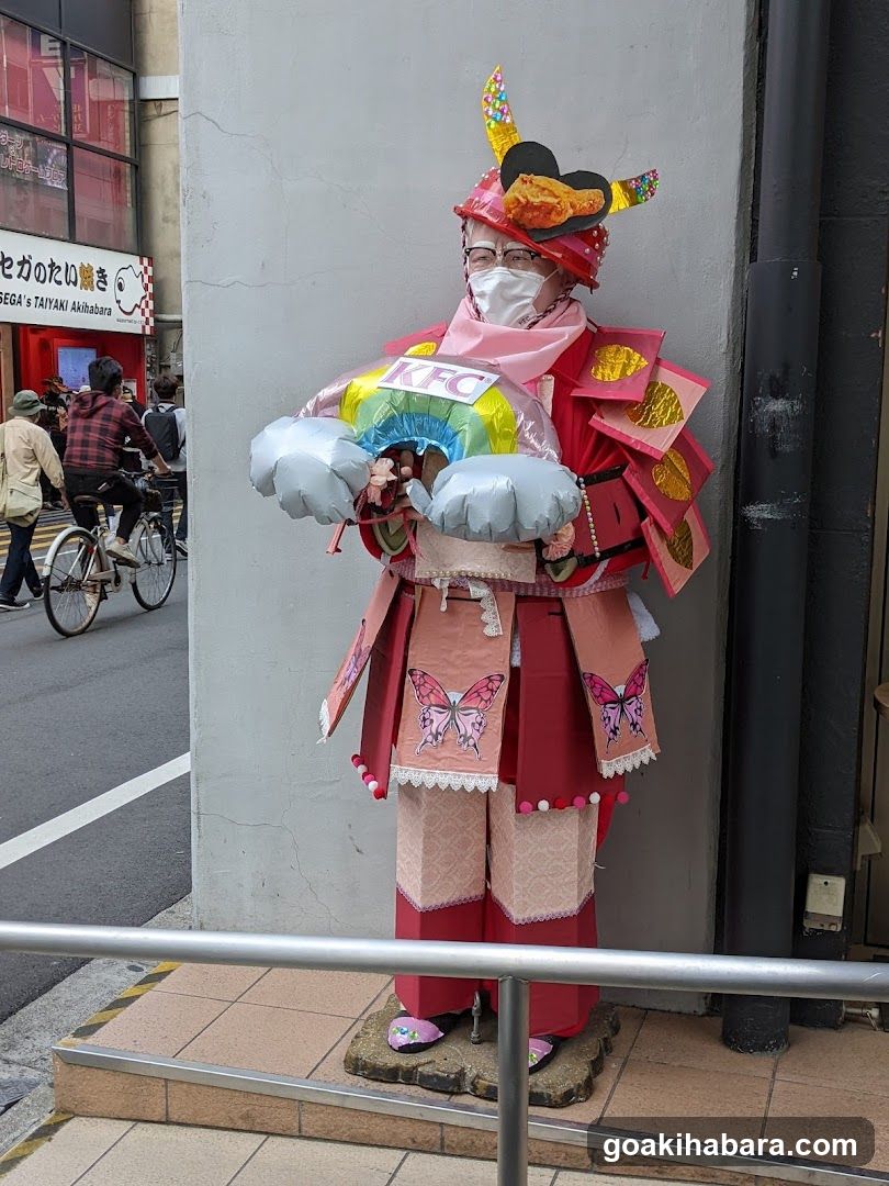 Costumed Figure with KFC Balloons