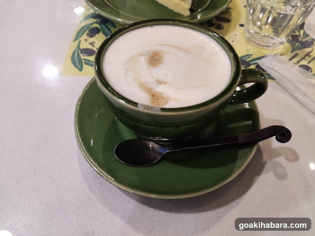 Green Coffee Cup with Foam Art
