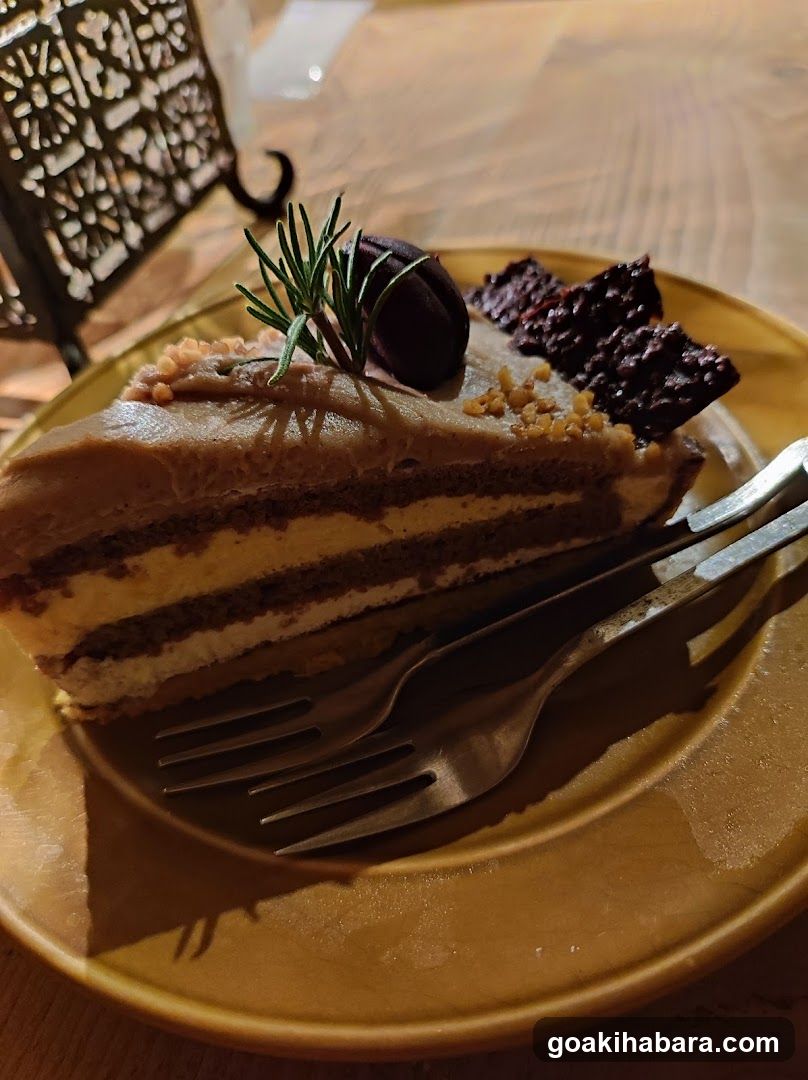 Slice of layered cake with garnish
