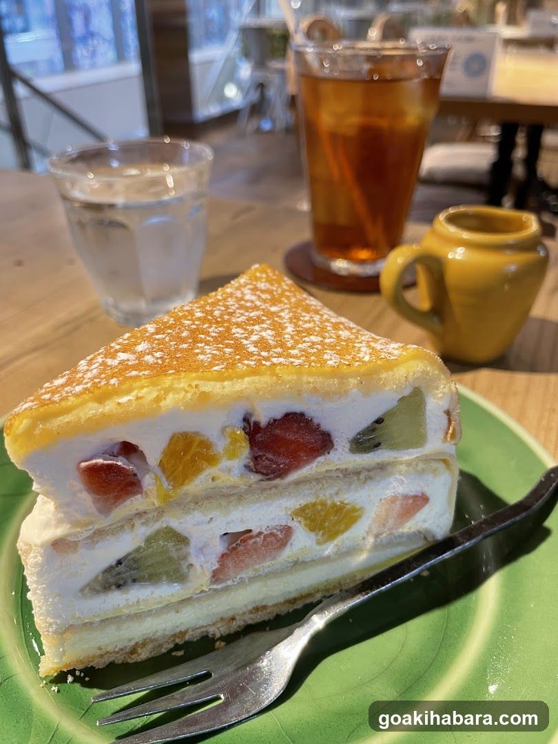 Fruit Layer Cake with Tea and Water