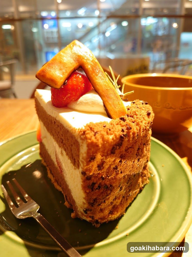 Cake Slice with Strawberry and Pastry Garnish