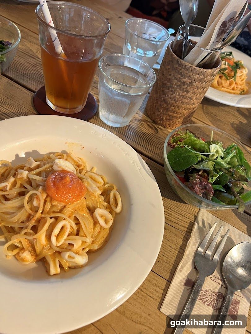 Pasta and Salad Meal at Restaurant