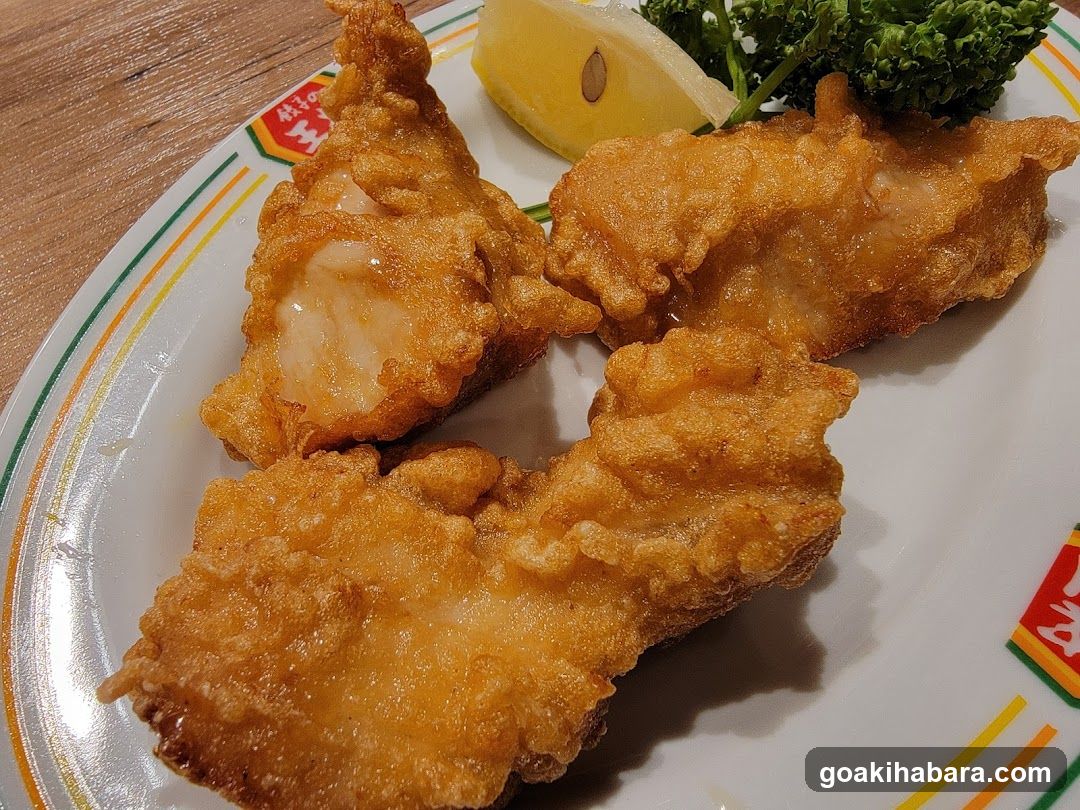 Fried Fish Fillets with Lemon and Greens