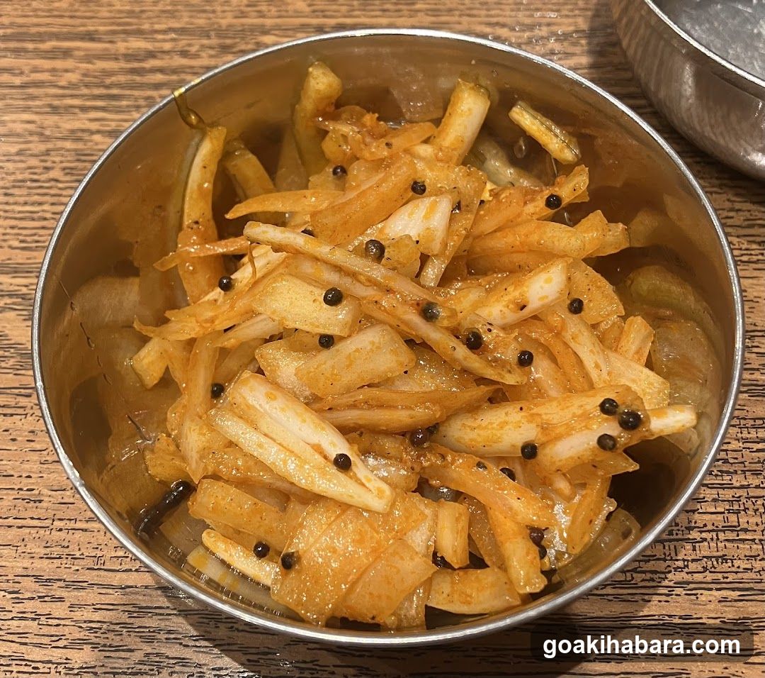 Bowl of pickled vegetables with peppercorns
