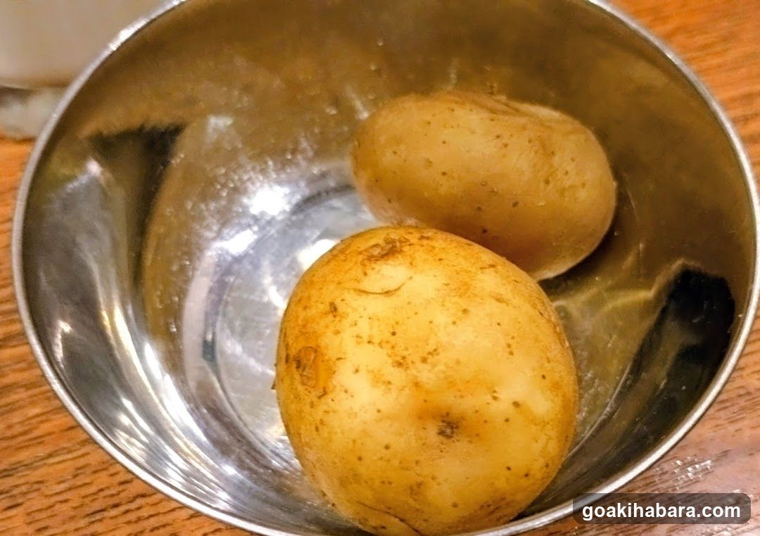 Potatoes in a metal bowl