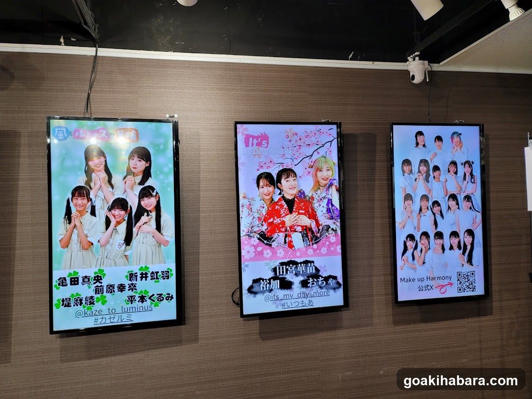 J-pop idol group posters on wall