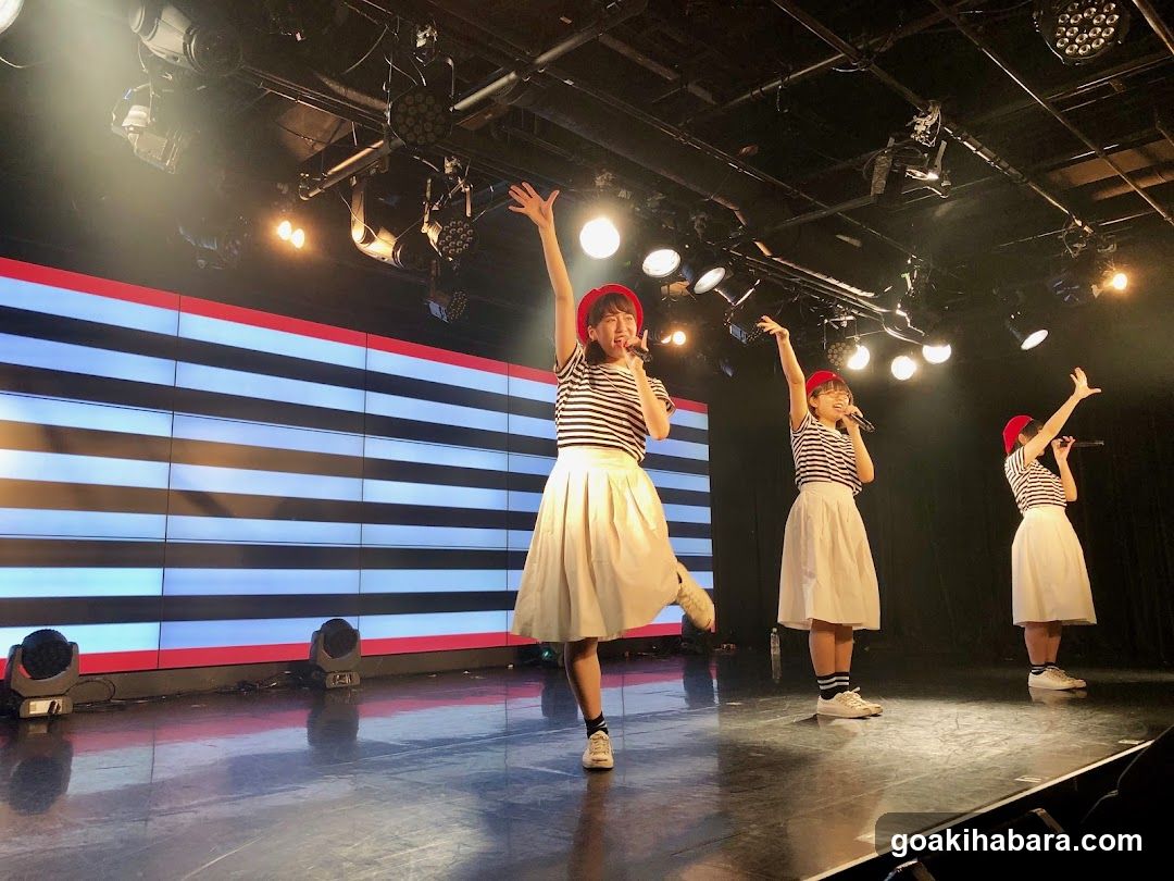 Stage Performance with Striped Outfits