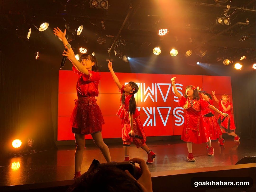Stage Performance with Red Costumes