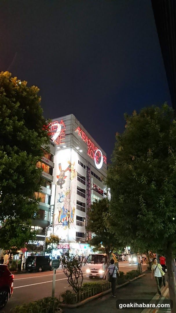Night street scene with illuminated building