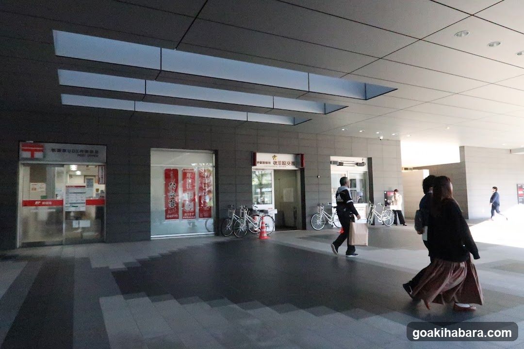 Entrance Hall with People and Bicycles