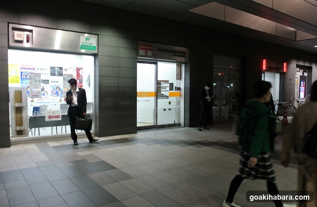 Street scene with pedestrians and storefronts