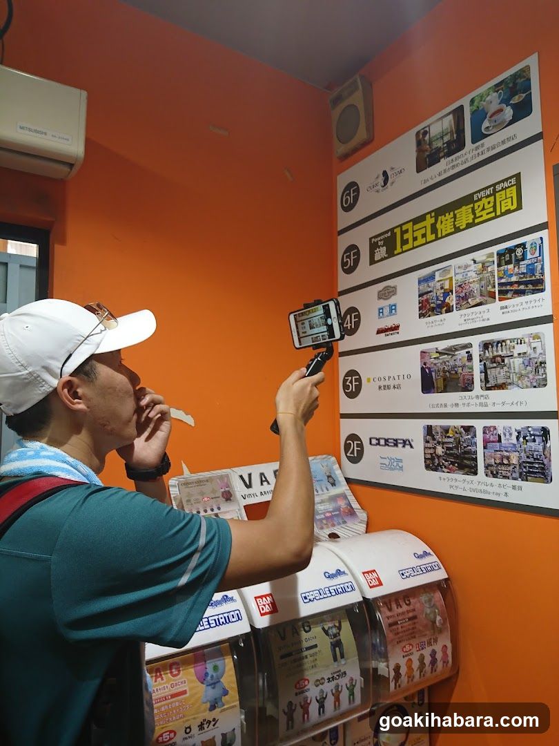 Interior of a shop with merchandise display and wall poster