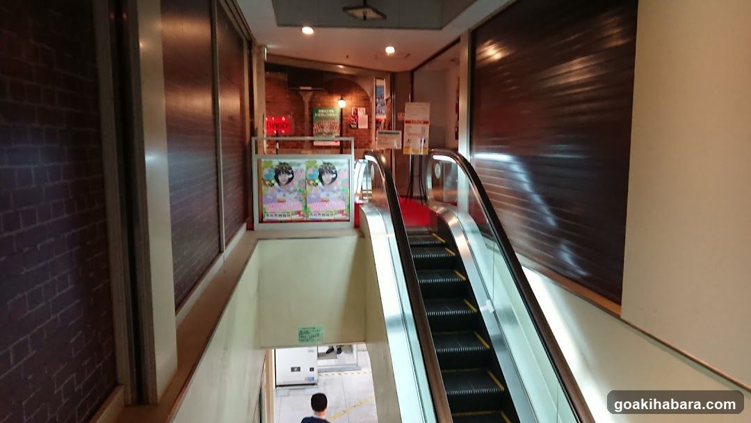 Shopping Center Interior with Escalator