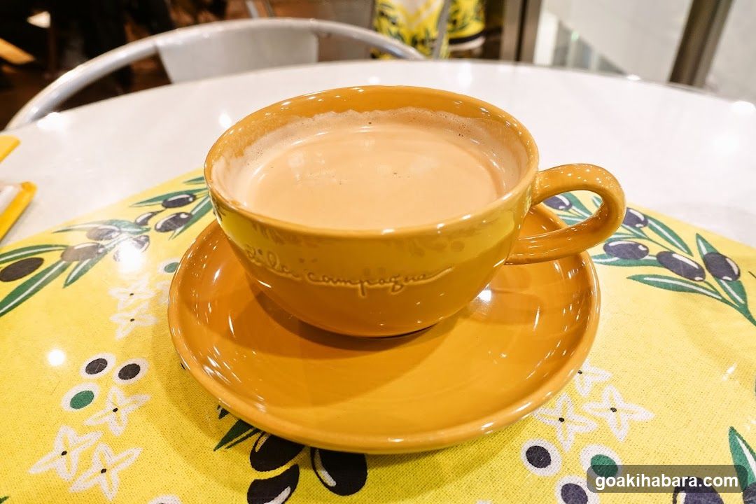 Yellow Coffee Cup on Table