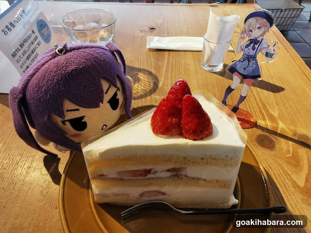Anime-themed dessert table setting