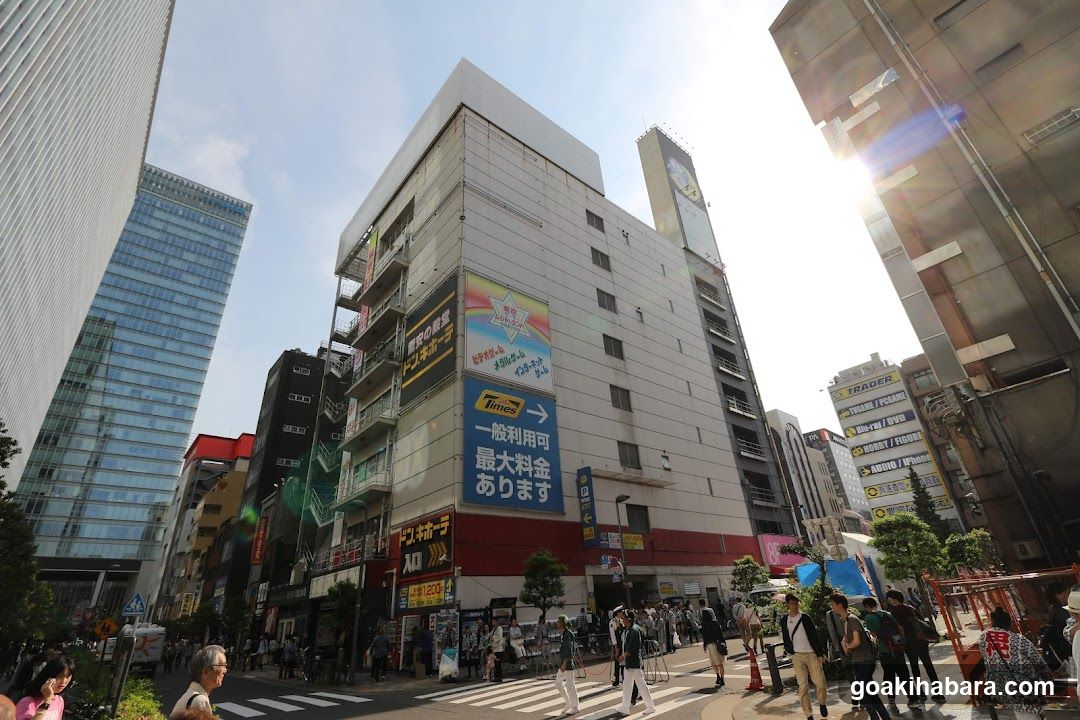 Urban street scene with buildings and pedestrians