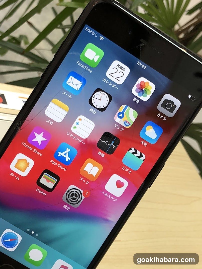 iPhone Home Screen with Cracked Display