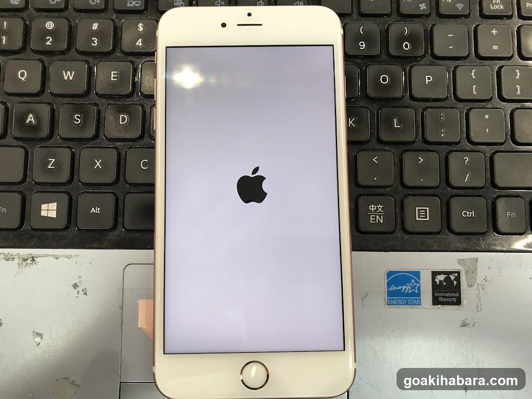 iPhone on laptop keyboard
