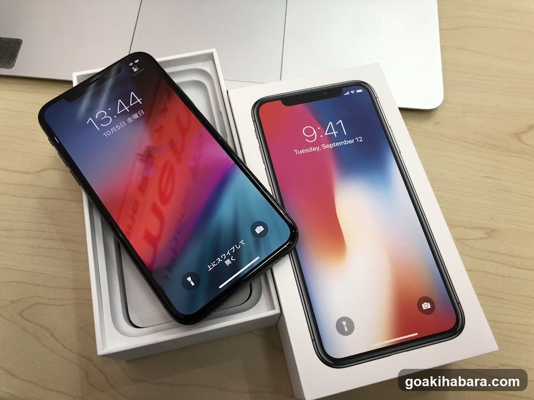 Two iPhones in boxes
